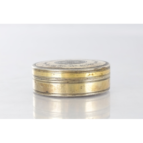 105 - AN EARLY 19TH CENTURY FRENCH SILVER GILT CIRCULAR SNUFF BOX with engraved floral decoration - hallma... 