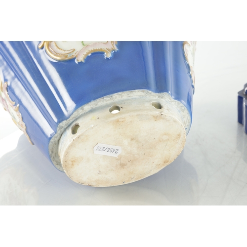 67 - A 19TH CENTURY MEISSEN FLOWER VASE on a blue ground with rococo style panels of flower sprays - pain... 