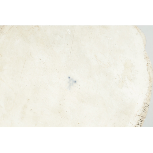 67 - A 19TH CENTURY MEISSEN FLOWER VASE on a blue ground with rococo style panels of flower sprays - pain... 