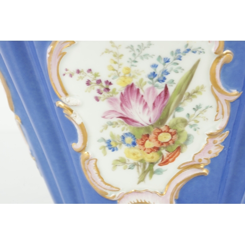 67 - A 19TH CENTURY MEISSEN FLOWER VASE on a blue ground with rococo style panels of flower sprays - pain... 