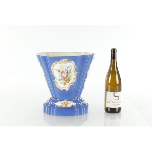 67 - A 19TH CENTURY MEISSEN FLOWER VASE on a blue ground with rococo style panels of flower sprays - pain... 