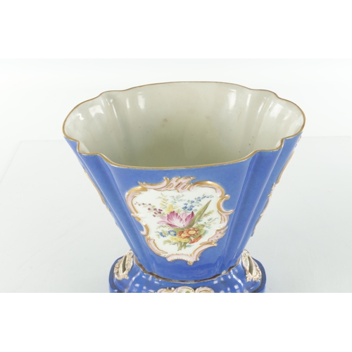 67 - A 19TH CENTURY MEISSEN FLOWER VASE on a blue ground with rococo style panels of flower sprays - pain... 