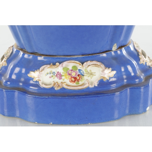 67 - A 19TH CENTURY MEISSEN FLOWER VASE on a blue ground with rococo style panels of flower sprays - pain... 