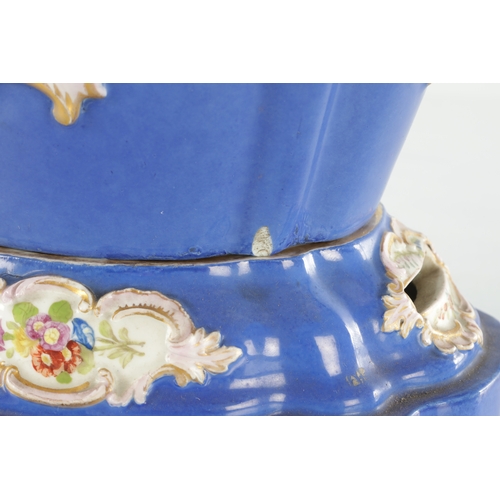 67 - A 19TH CENTURY MEISSEN FLOWER VASE on a blue ground with rococo style panels of flower sprays - pain... 