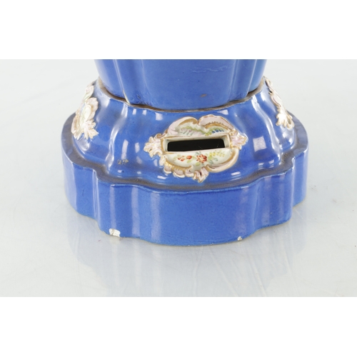 67 - A 19TH CENTURY MEISSEN FLOWER VASE on a blue ground with rococo style panels of flower sprays - pain... 