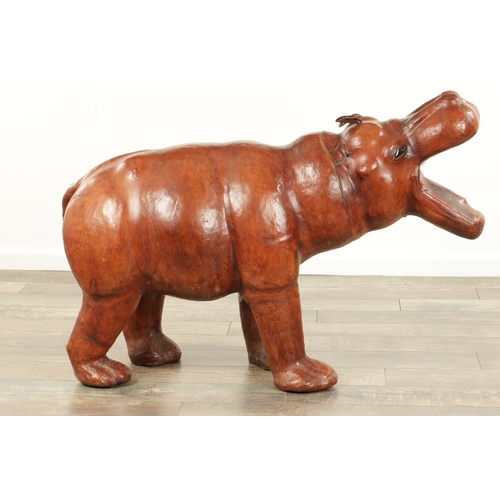 877 - A LARGE VINTAGE LEATHER BOUND SCULPTURE OF A HIPPOPOTAMUS in the manner of Liberty having glass eyes... 