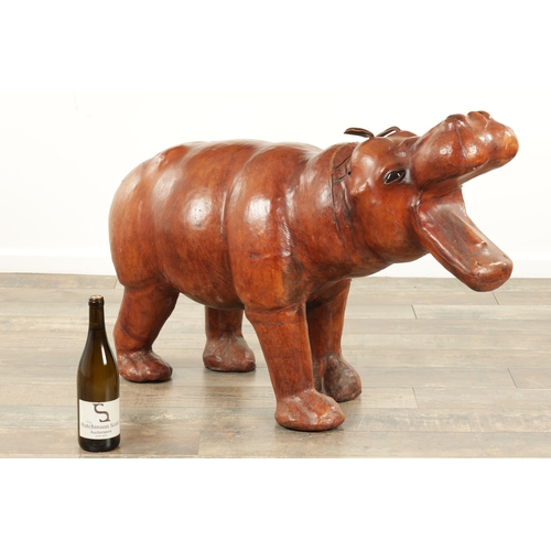877 - A LARGE VINTAGE LEATHER BOUND SCULPTURE OF A HIPPOPOTAMUS in the manner of Liberty having glass eyes... 