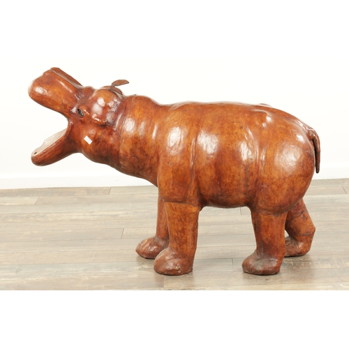 877 - A LARGE VINTAGE LEATHER BOUND SCULPTURE OF A HIPPOPOTAMUS in the manner of Liberty having glass eyes... 