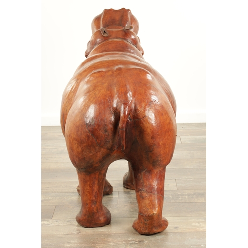 877 - A LARGE VINTAGE LEATHER BOUND SCULPTURE OF A HIPPOPOTAMUS in the manner of Liberty having glass eyes... 