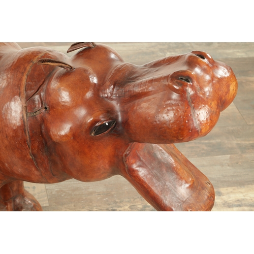 877 - A LARGE VINTAGE LEATHER BOUND SCULPTURE OF A HIPPOPOTAMUS in the manner of Liberty having glass eyes... 