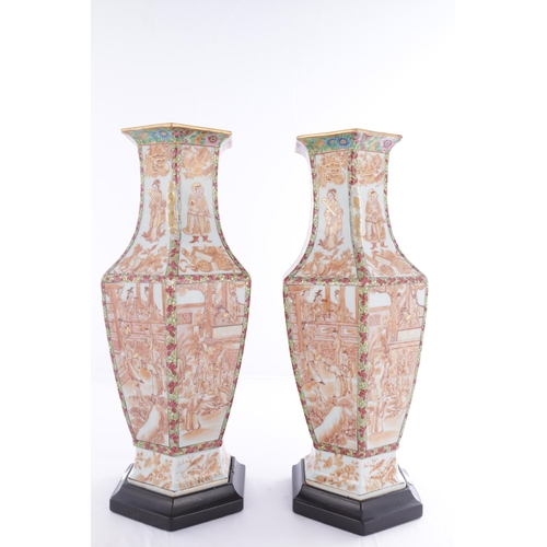 86 - A PAIR OF 18TH CENTURY CANTONESE CHINESE VASES of hexagonal form with shaped side handles, decorated... 