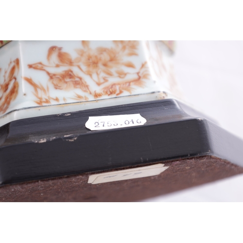 86 - A PAIR OF 18TH CENTURY CANTONESE CHINESE VASES of hexagonal form with shaped side handles, decorated... 