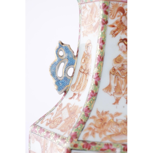 86 - A PAIR OF 18TH CENTURY CANTONESE CHINESE VASES of hexagonal form with shaped side handles, decorated... 