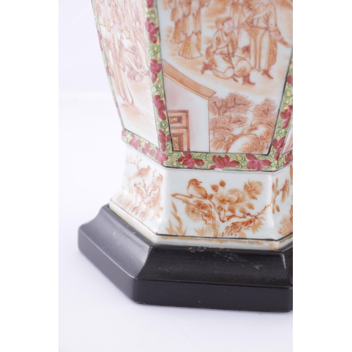 86 - A PAIR OF 18TH CENTURY CANTONESE CHINESE VASES of hexagonal form with shaped side handles, decorated... 