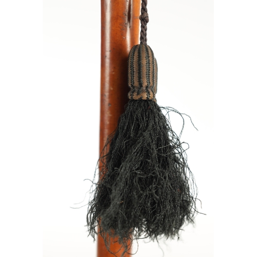 854 - A 19TH CENTURY IVORY HANDLED SWORD CANE, the spherical ivory pommel with malacca grip handle on a tr... 