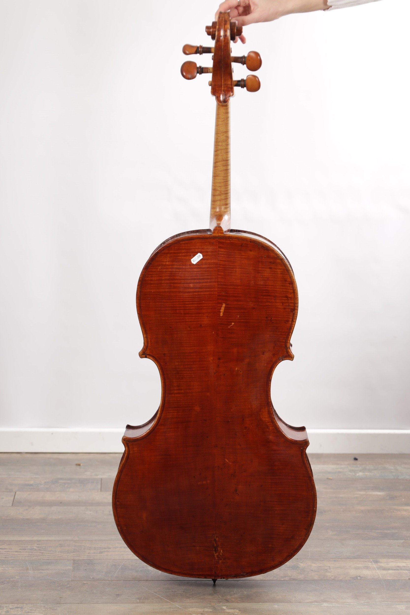 AN 18TH CENTURY CELLO IN THE MANNER OF LOCKEY HILL with two bows and a ...
