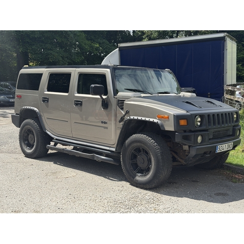A 2002 HUMMER H2 6 LITRE V8 SUV finished in beige with black wheel arch ...