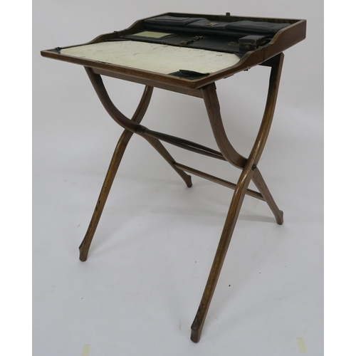 61 - A 19th century oak campaign style folding desk with fitted leather interior 78cm high x 56cm wide x ... 