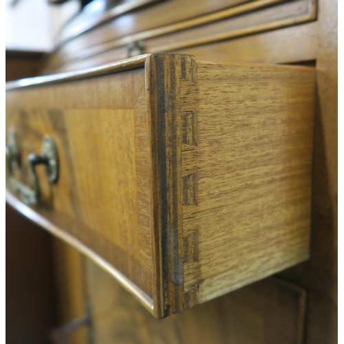 67 - A 20th century mahogany drinks cabinet 153cm high x 72cm wide x 46cm deep