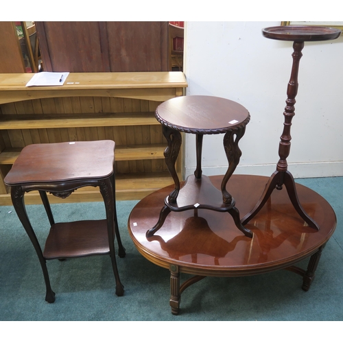 70 - A 20th century mahogany oval coffee table,mahogany circular two tier occasional table,another two ti... 