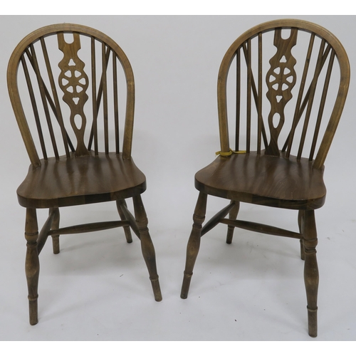 72 - A set of five 20th century beech wheel back dining chairs (5)