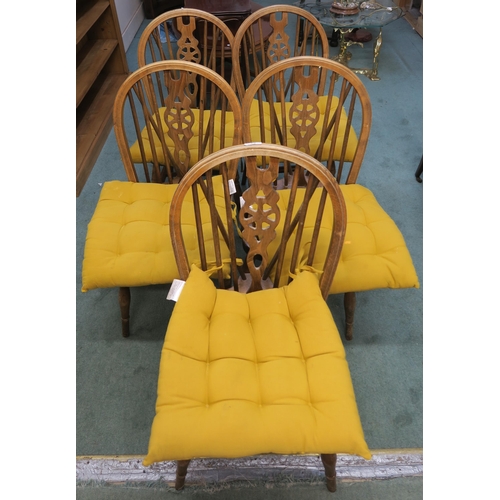 72 - A set of five 20th century beech wheel back dining chairs (5)