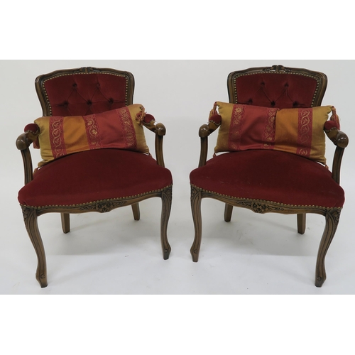 73 - A pair of contemporary button back parlour armchairs and a modern hardwood tub chair (3)