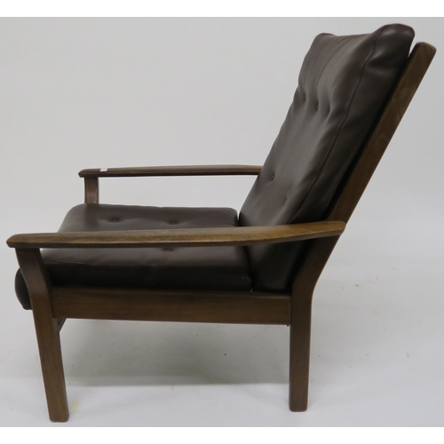 76 - A mid 20th century Cintique teak framed armchair with brown vinyl upholstery