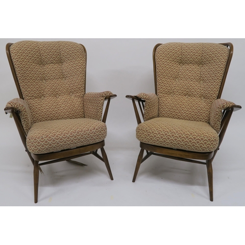 77 - A pair of mid 20th century beech Ercol tall back easy chairs (2)