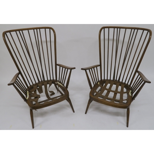 77 - A pair of mid 20th century beech Ercol tall back easy chairs (2)