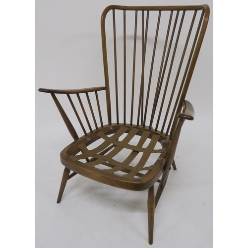 78 - A mid 20th century beech Ercol tall back easy chair