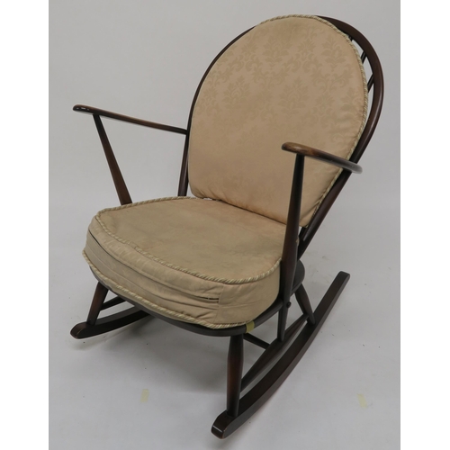 80 - A mid 20th century beech and elm Ercol rocking chair