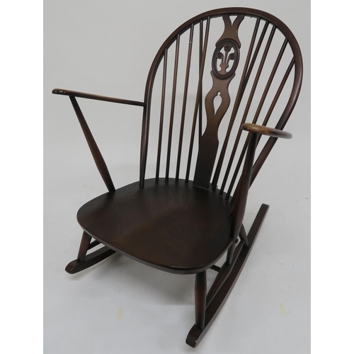 80 - A mid 20th century beech and elm Ercol rocking chair