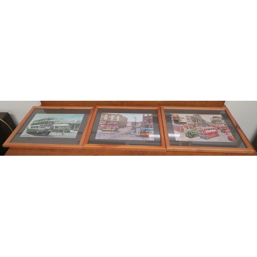 87 - A lot of thirteen assorted framed prints of buses and trams (13)