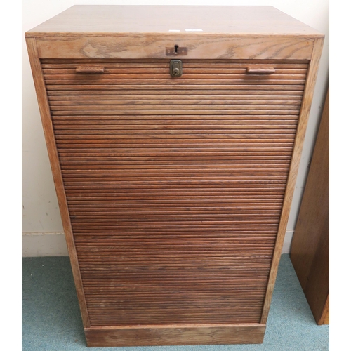 90 - A 20th century oak tambour front filing cabinet 111cm high x 66cm wide x 50cm deep