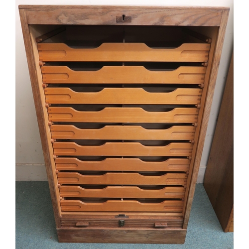 90 - A 20th century oak tambour front filing cabinet 111cm high x 66cm wide x 50cm deep