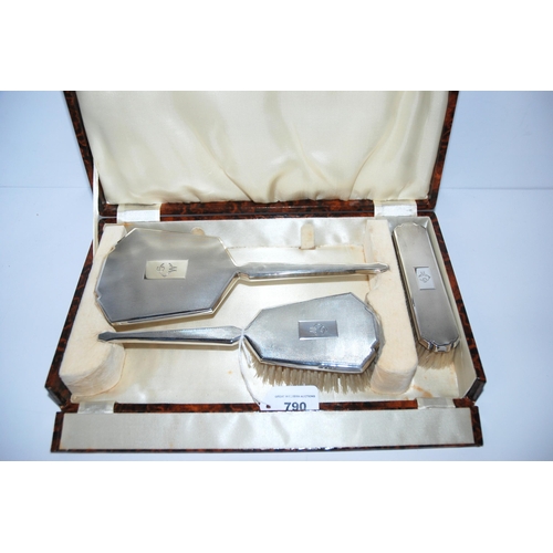 790 - A cased three-piece silver dressing table set, Birmingham 1936