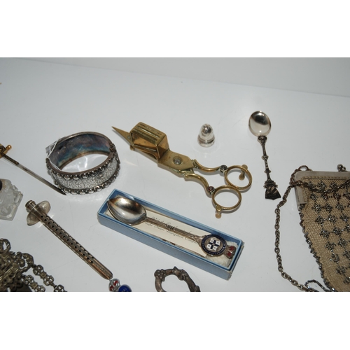 791 - A lot comprising a white-metal chatelaine, part baby rattle, grape scissors, snuffers, bangle etc