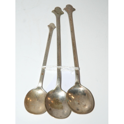 796 - A silver Cranston tearoom style trefoil spoon, Sheffield 1921, 12.5cm long with two similar white-me... 