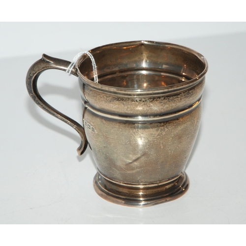 805 - A silver christening mug Birmingham 1934 7 cm high 74 grams