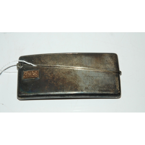 808 - A silver card case London 1935 rectangular curved body with engine turned decoration monogrammed 