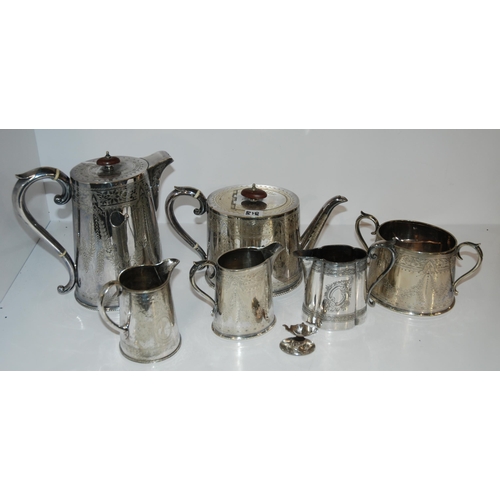 818 - A tray lot of EP - four piece tea service, two cream jugs, caddy spoon, tongs etc.