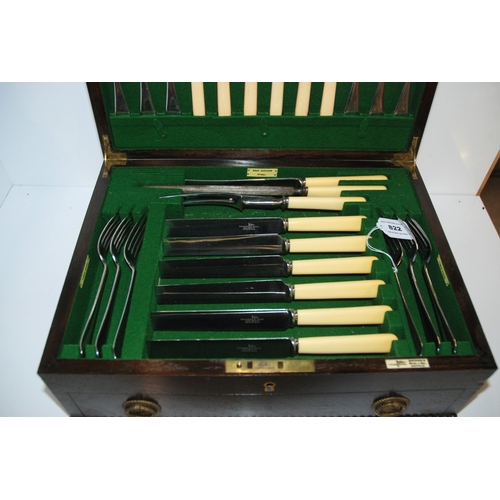 822 - A fifty one piece EP & bone handled cutlery set in oak canteen