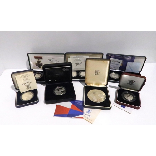 840 - A lot comprising a Falkland Island silver proof £25 coin (150 grams) & thirty nine (approx.) various... 