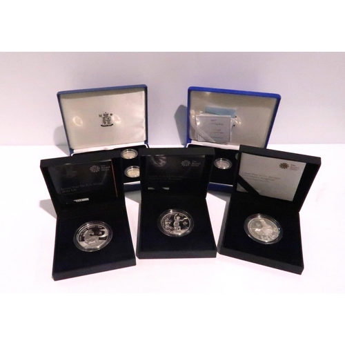 842 - A lot comprising sixteen assorted cased silver proof coins & coin sets