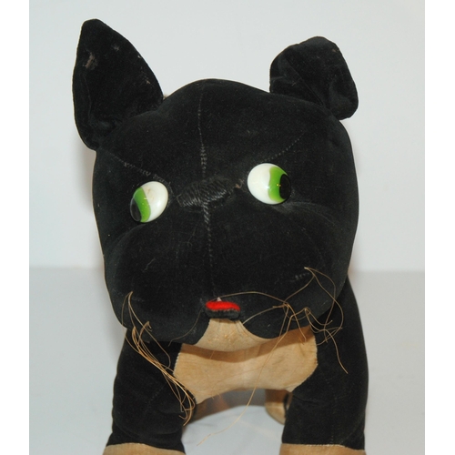 355 - A Einko style dog with stich claws, 26cm wide and a musical cat (2)