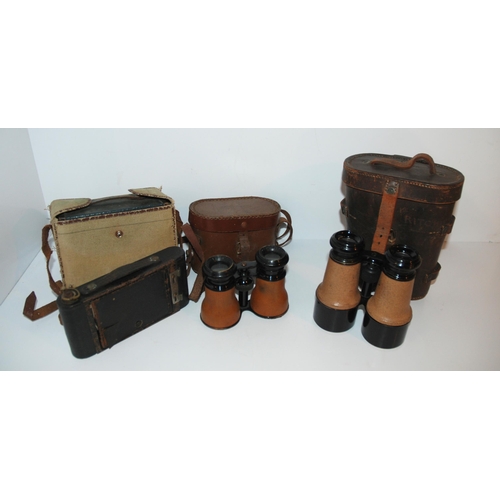 367 - A pair of vintage binocular, another pair, folding camera etc 