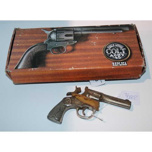 380 - A single action Colt Army 45 replica in box and a small pellet gun