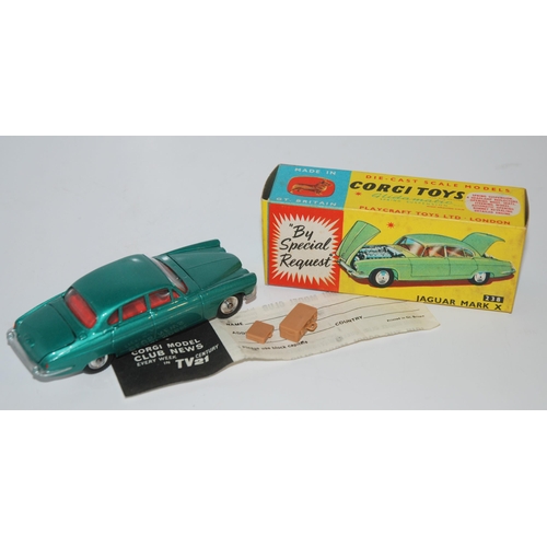 399 - A Corgi No. 238 Jaguar Mk X comprising of metallic sea green body with red interior and spun hubs, i... 