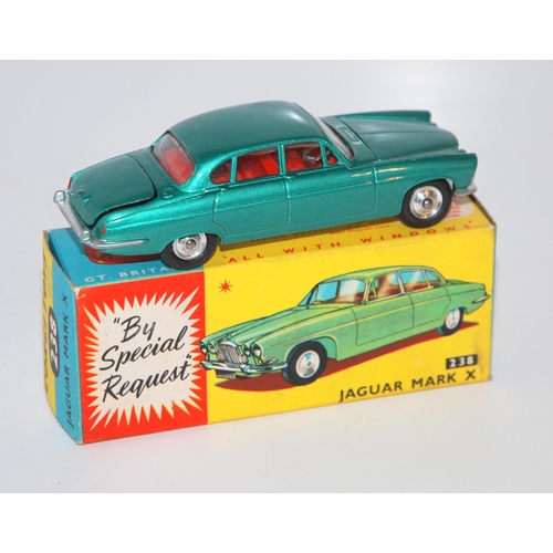 399 - A Corgi No. 238 Jaguar Mk X comprising of metallic sea green body with red interior and spun hubs, i... 